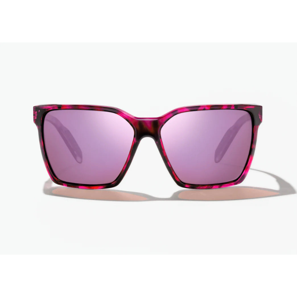 pink-tinted sunglasses with a black and pink tortoise shell design frames.