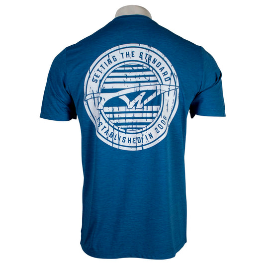 Back view of a blue T-shirt with a circular graphic and text that says 'Setting the Standard' and 'Established in 2006'.