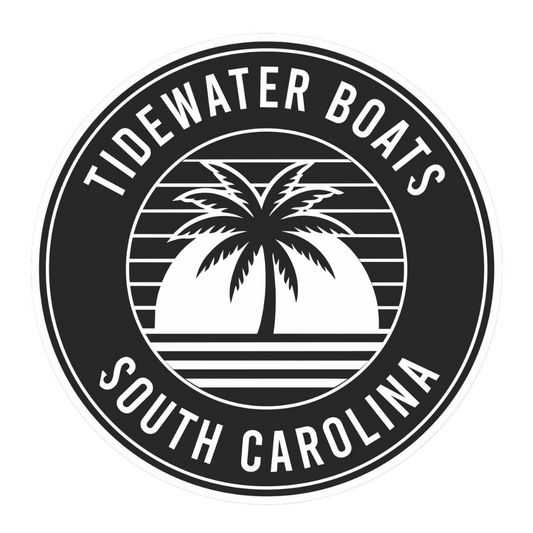 Black, circular decal of palm tree and horizon with the text Tidewater Boats South Carolina.