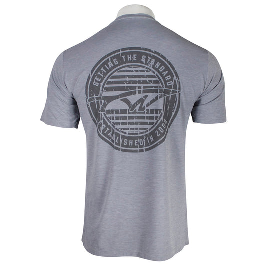 Back view of a gray t-shirt with a circular tidewater logo and the text 'setting the standard, established in 2006'