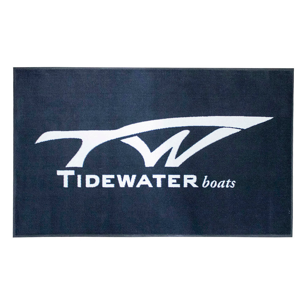 A black rug with the tidewater logo in white.