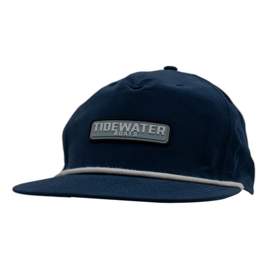Navy blue cap with a grey rubber patch containing the Tidewater logo and a white rope across the bill.